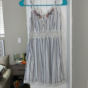 a dress with blue and white stripes & flowers